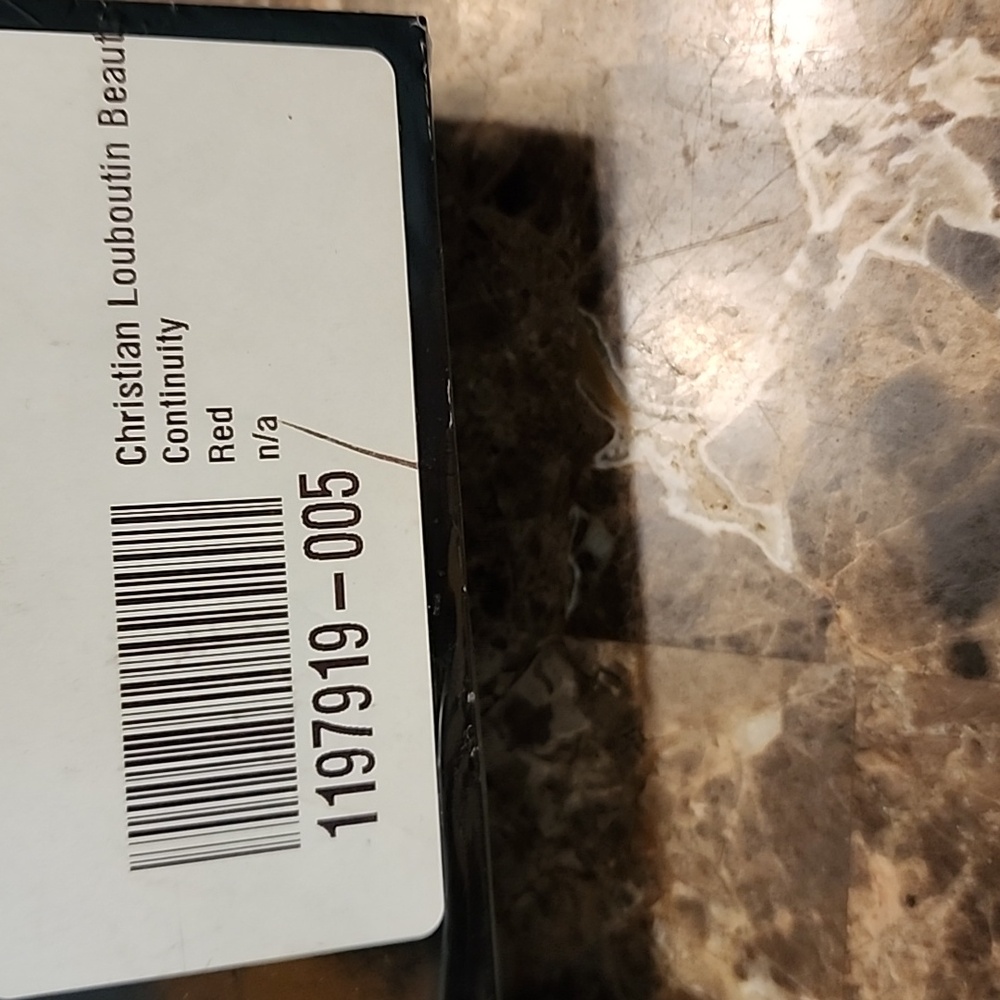 Christian Louboutin Beaute Red